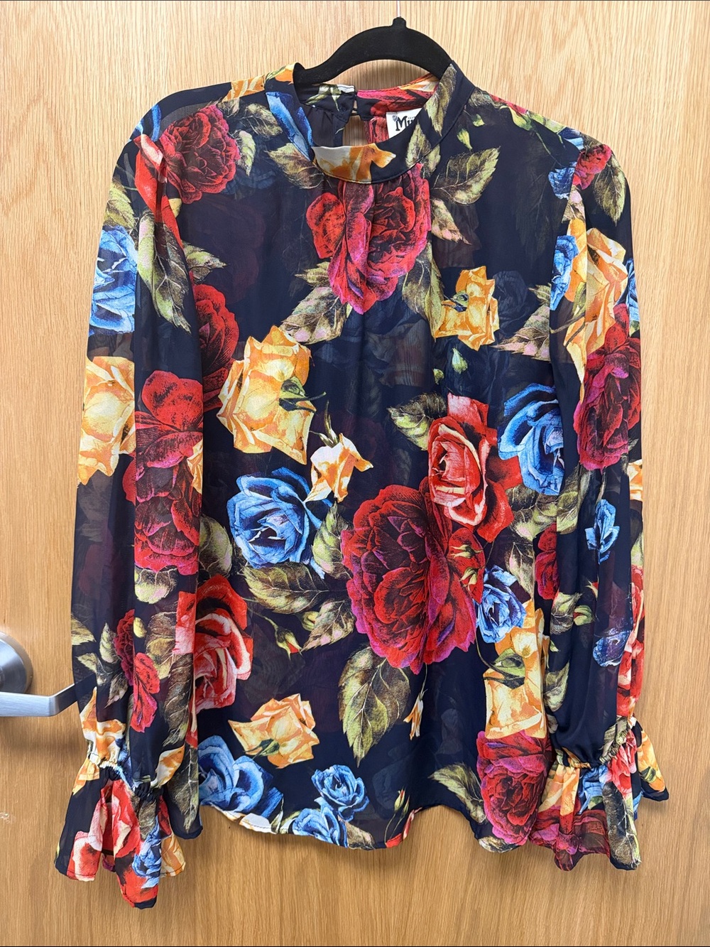 Show Me Your MuMu Black Floral Mock-Neck Blouse with Red, Blue & Yellow Roses